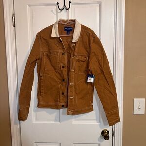Light brown jean jacket. Jc penny. Never worn